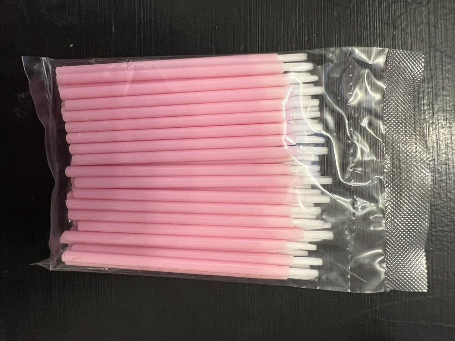 Disposable lip wands with pink handle