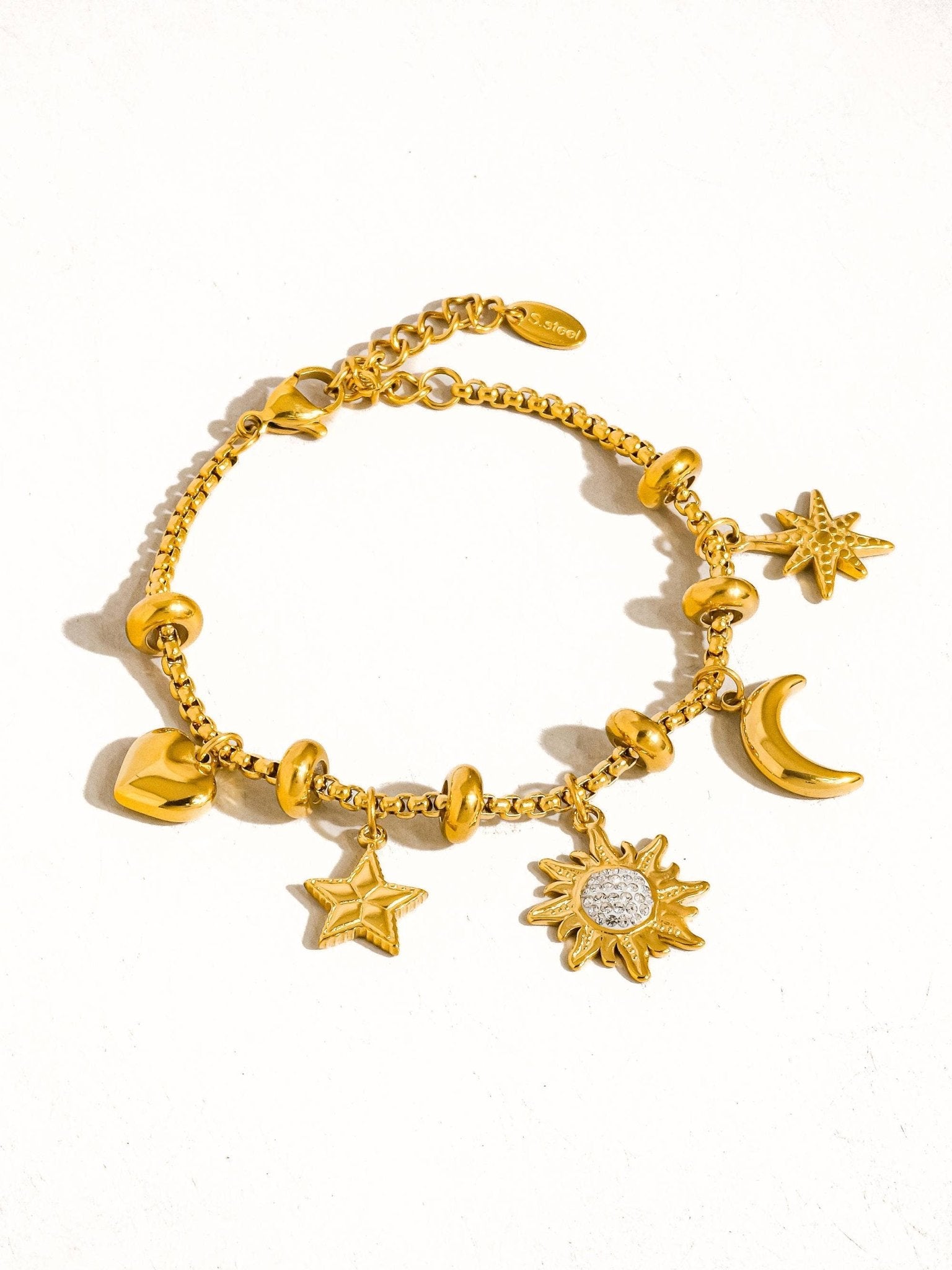 Fenix 18K Gold Non - Tarnish Star And Moon Charm Bracelet: Yellow Gold - Lalka Beauty Co.